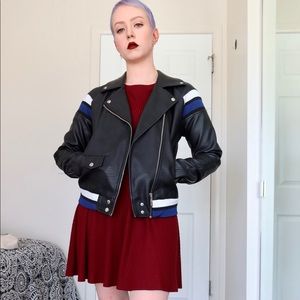 Black leather jacket with blue and white details